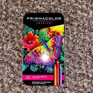 Prismacolor pencils. Used one time since bought
